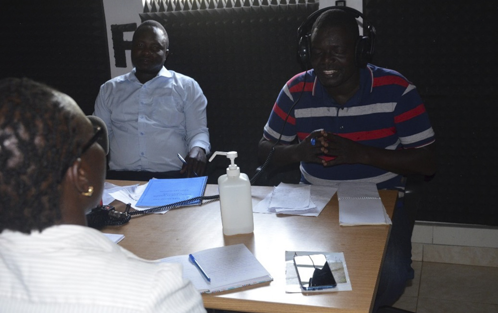 community development officer speaking during a broadcast panel discussion