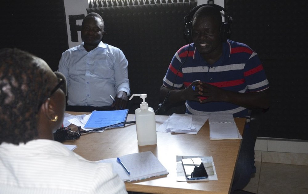 community development officer speaking during a broadcast panel discussion
