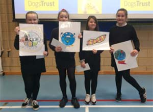 children presenting their hand drawn pictures