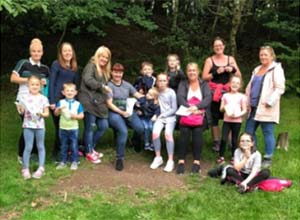 group of children and adults out for a walk in castlehill