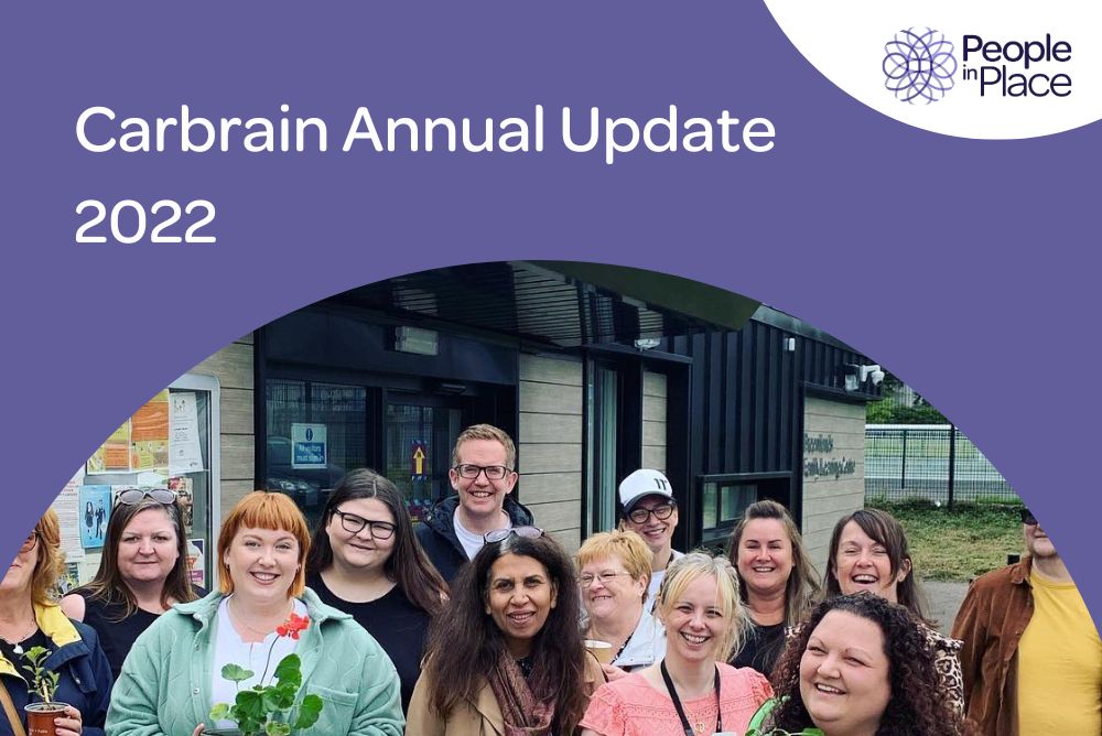 group of community members smiling with the text 'carbrain annual update 2022'