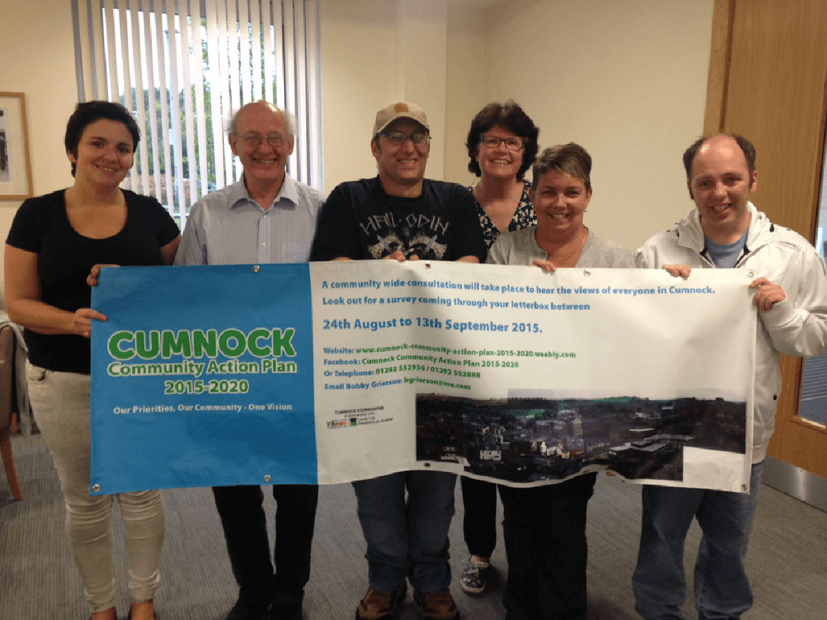 Cumnock Action Plan Group holding poster