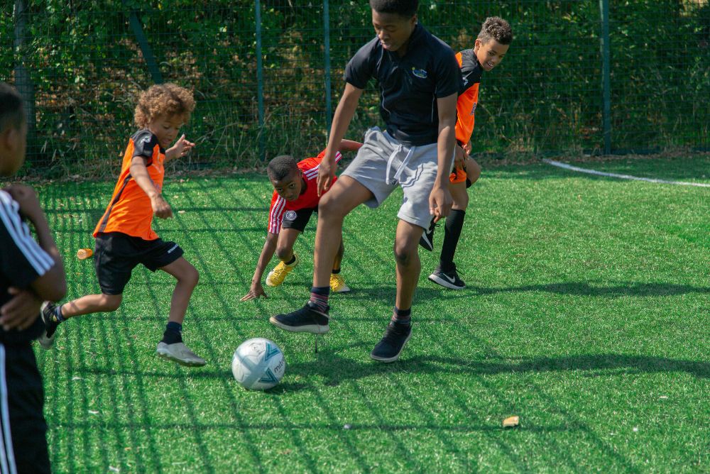 Kids playing football