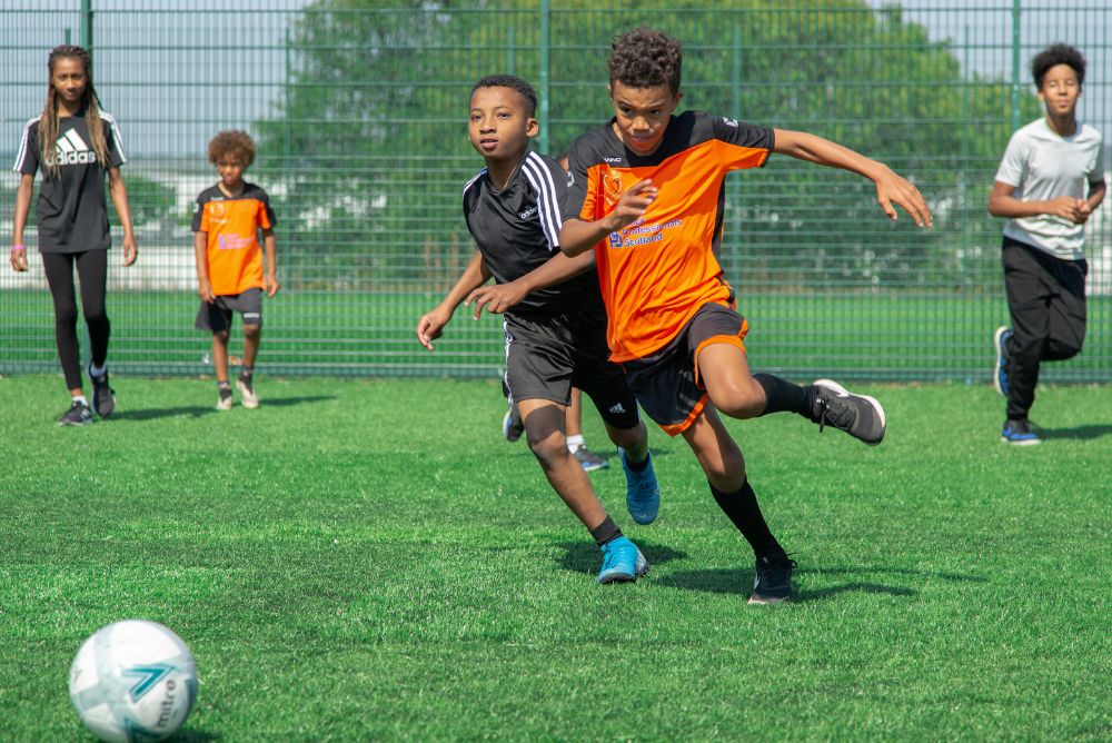 Kids playing football